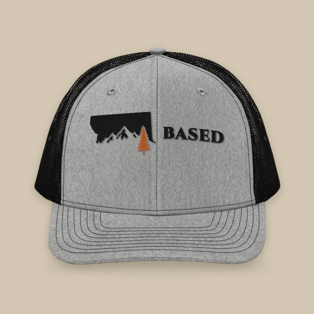 A gray and black trucker hat with the BASED logo embroidered on the front
